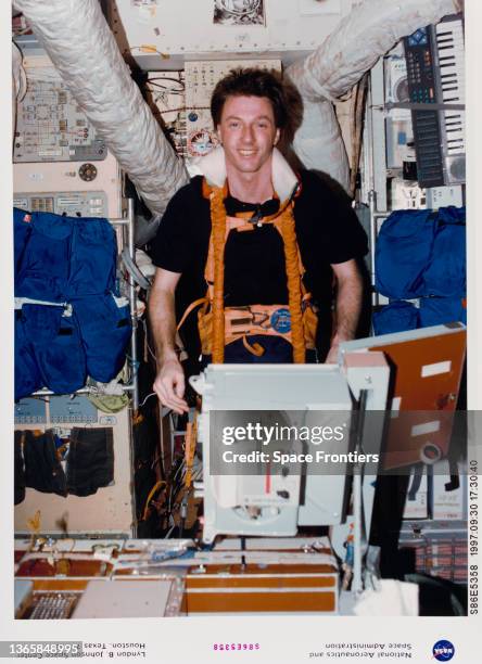American NASA astronaut C Michael Foale exercising on a treadmill onbard the Space Station Mir as part of Space Shuttle Atlantis mission STS-86, 30th...