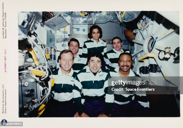 The traditional in-flight crew portrait in the mid-deck area of the Space Shuttle Columbia during mission STS-87, 19th November to 5th December 1997....