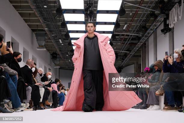 Model walks the runway during the Rains Menswear Fall/Winter 2022-2023 show as part of Paris Fashion Week on January 20, 2022 in Paris, France.