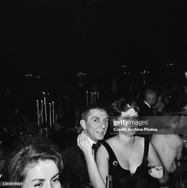 American actress Carolyn Jones and her husband, producer Aaron Spelling at the Thalian ball, USA, 1964.