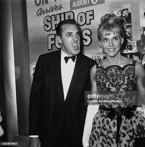 American actor and comedian Jim Nabors and actress Maggie Peterson at a premiere of the film 'Ship of Fools', USA, 1965.