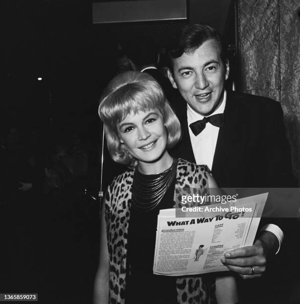 American singer Bobby Darin and his wife, actress Sandra Dee at a party for the comedy film 'What A Way To Go!', USA, 1964.