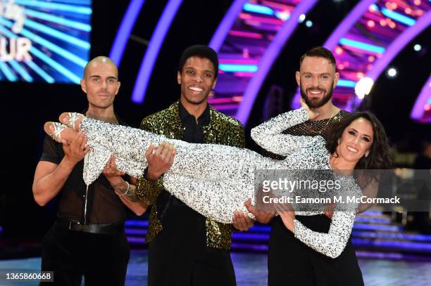 Max George, Rhys Stephenson and John Whaite hold host Janette Manrara during the 'Strictly Come Dancing Live Tour - press launch' at Utilita Arena...