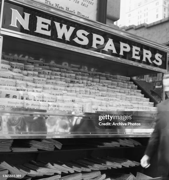 Newspaper stand in New York City, USA, circa 1940.