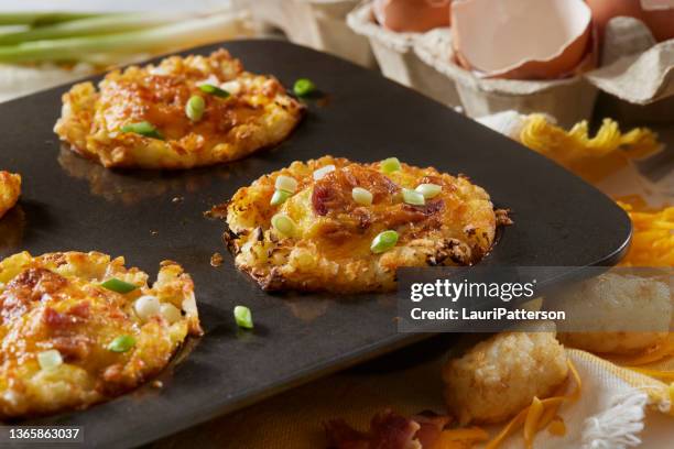 preparing crispy tatar tot breakfast egg cups - muffin tin stock pictures, royalty-free photos & images