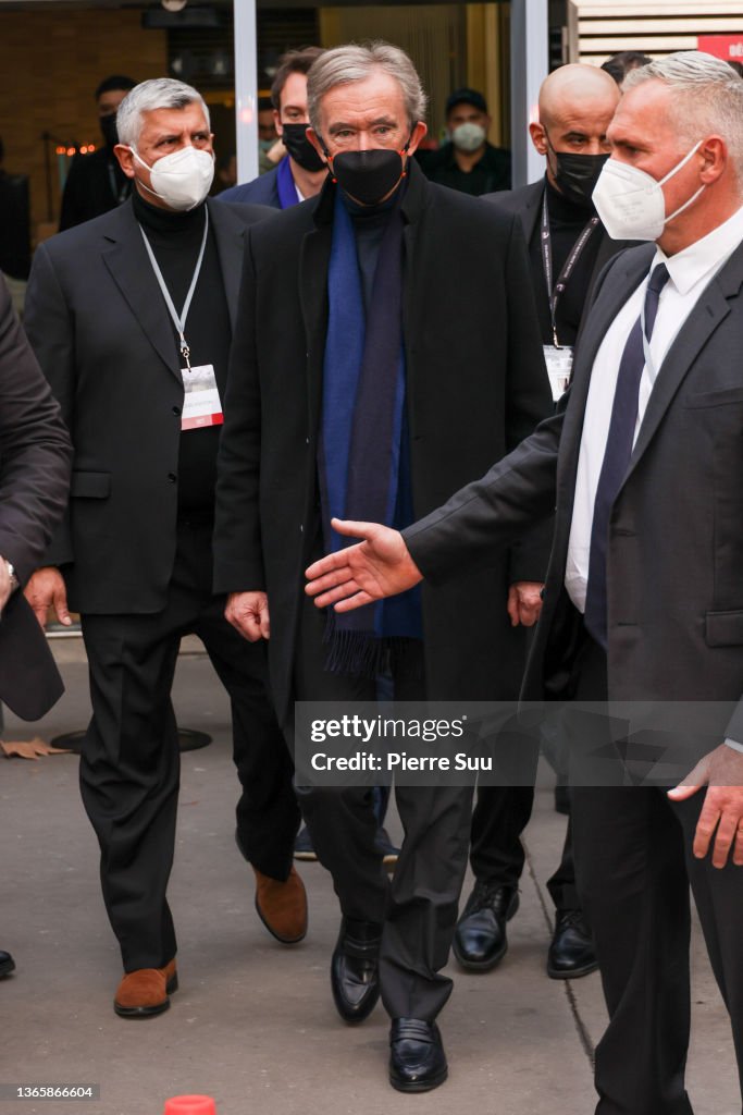 Bernard Arnault leaves the Vuitton show at le carreau du temple