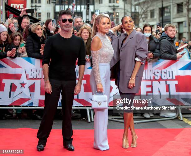 Simon Cowell, Amanda Holden and Alesha Dixon arrive at the Britain's Got Talent Auditions at London Palladium on January 20, 2022 in London, England.