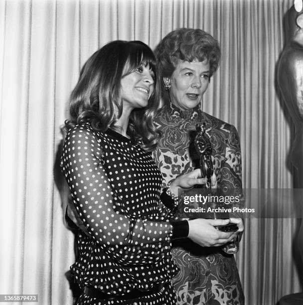 British actress Julie Christie presents the award for Best Actor to actress Wendy Hiller at the 39th Academy Awards at the Santa Monica Civic...