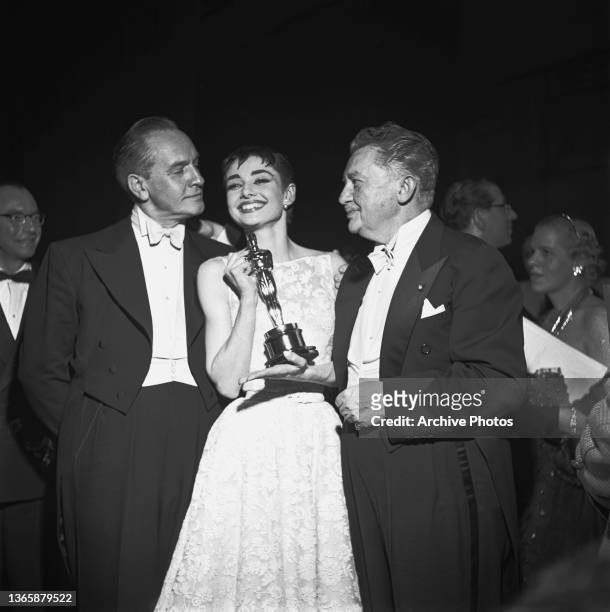 Actress Audrey Hepburn with her award for Best Actress for her role in the film 'Roman Holiday' at the 26th Academy Awards at the NBC Century Theatre...