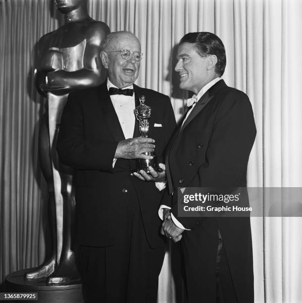 British-American comedian Bob Hope with Paramount studio head Y. Frank Freeman at the 39th Academy Awards at the Santa Monica Civic Auditorium in...