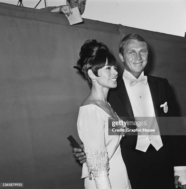 American actor Steve McQueen and his wife Neile Adams attend the Academy Awards at the Santa Monica Civic Auditorium in California, USA, 13th April...
