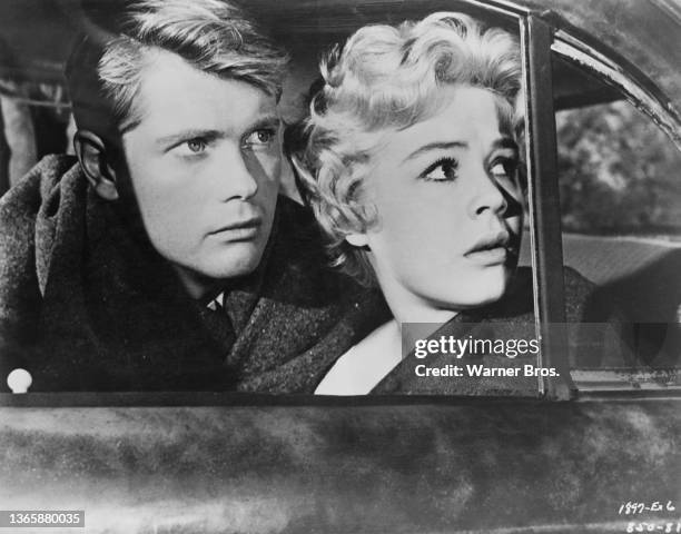 Scene from the film 'A Summer Place', written and directed by Delmer Daves, USA, 1959. The scene features actors Troy Donahue and Sandra Dee.