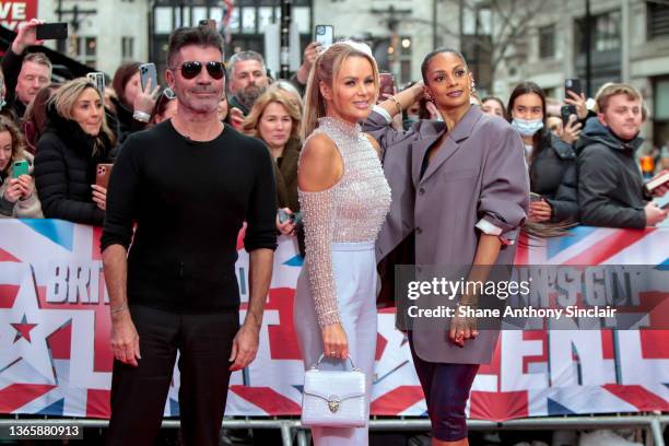 Simon Cowell, Amanda Holden and Alesha Dixon arrive at the Britain's Got Talent Auditions at London Palladium on January 20, 2022 in London, England.