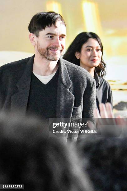 Fashion designers Christophe Lemaire and Sarah-Linh walk the runway during the Lemaire Ready to Wear Fall/Winter 2022-2023 fashion show as part of...