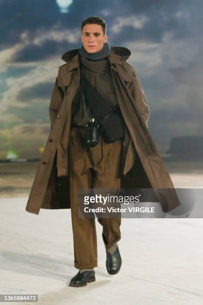 Model walks the runway during the Lemaire Ready to Wear Fall/Winter 2022-2023 fashion show as part of the Paris Men Fashion Week on January 19, 2022...