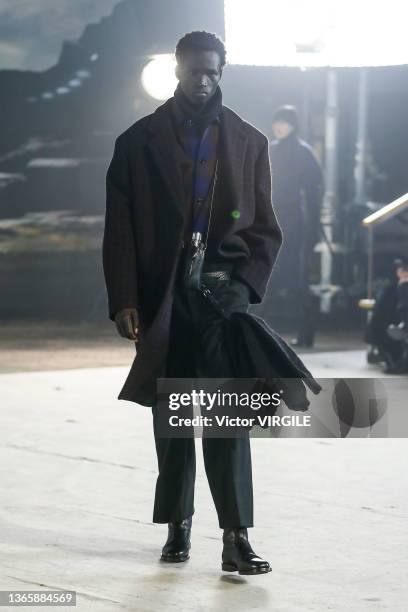 Model walks the runway during the Lemaire Ready to Wear Fall/Winter 2022-2023 fashion show as part of the Paris Men Fashion Week on January 19, 2022...