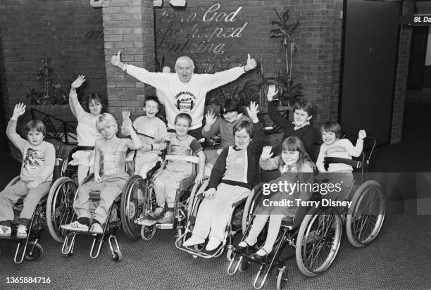 English television personality Jimmy Savile at a party for children with disabilities, UK, 8th January 1985.