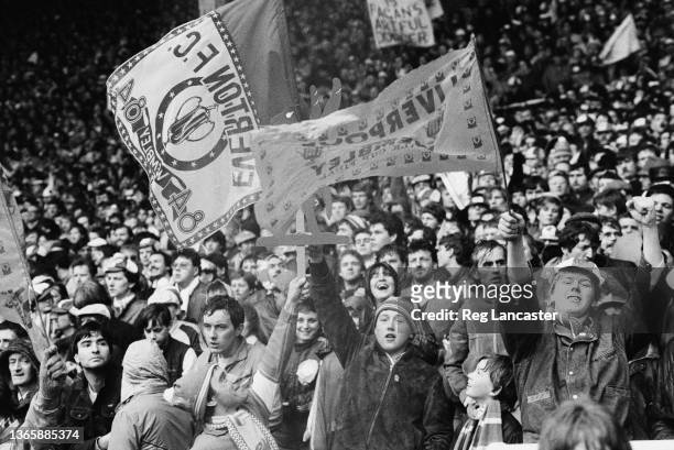 Fans at the 1984 Football League Cup Final, known as the Milk Cup Final, contested between Everton and Liverpool at Wembley Stadium in London, UK,...