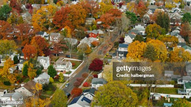 drone view of suburban streets in fall in stamford, ct - connecticut stock pictures, royalty-free photos & images