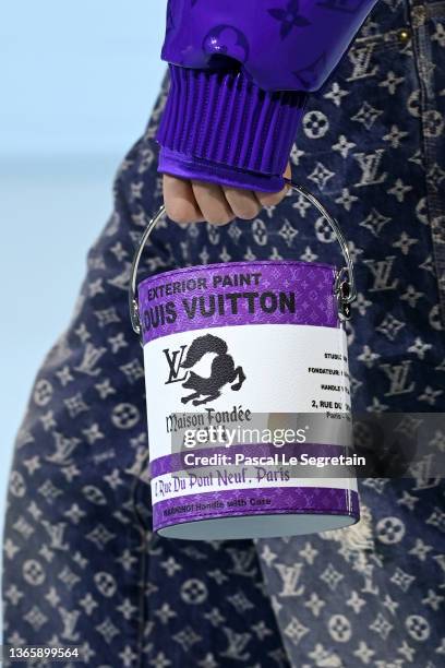 Model, bag detail, walks the runway during the Louis Vuitton Menswear Fall/Winter 2022-2023 show as part of Paris Fashion Week on January 20, 2022 in...