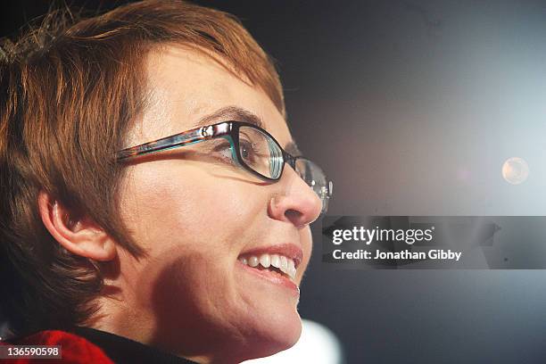 Rep. Gabrielle Giffords smiles during the "Remembering January 8th Candlelight Vigil" held at the University of Arizona Mall January 8, 2012 in...