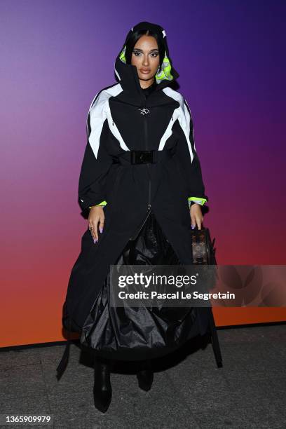 Amina Muaddi attends the Louis Vuitton Fall/Winter 2022/2023 show as part of Paris Fashion Week on January 20, 2022 in Paris, France.