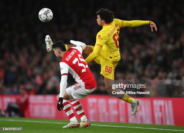 Gabriel Martinelli of Arsenal battles with Trent Alexander-Arnold of Liverpool during the Carabao Cup Semi Final Second Leg match between Arsenal and...