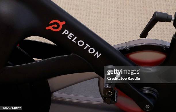 Peloton bike on the showroom floor on January 20, 2022 in Coral Gables, Florida. Reports indicate that Peloton Interactive Inc is temporarily halting...