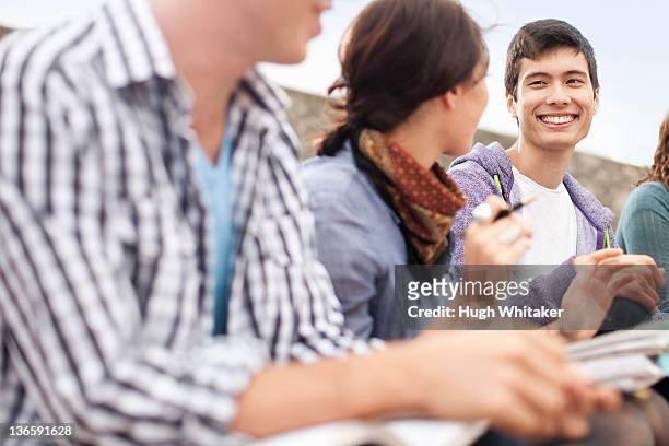 students studying together outdoors - peterborough ontario stockfoto's en -beelden