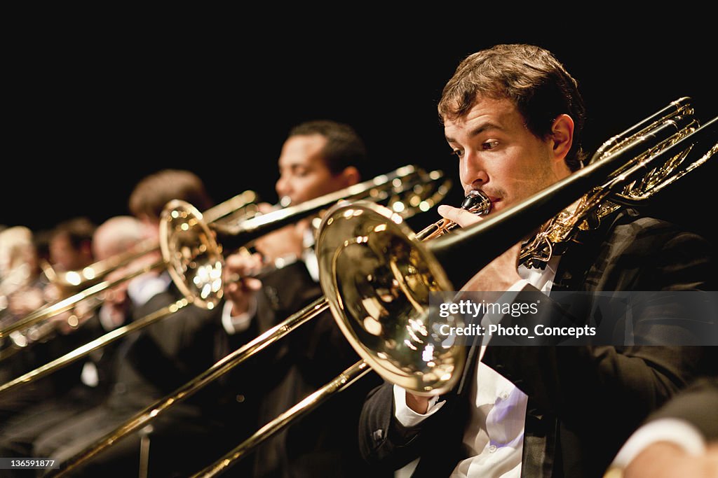 Trumpet players in orchestra