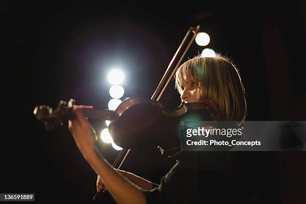 violin player in orchestra - classical stockfoto's en -beelden
