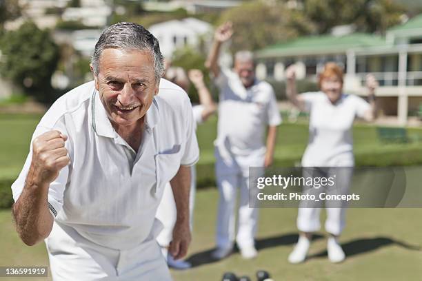 older people playing lawn bowling - championship day four stock pictures, royalty-free photos & images