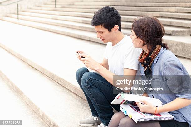 students studying together on steps - peterborough ontario stockfoto's en -beelden