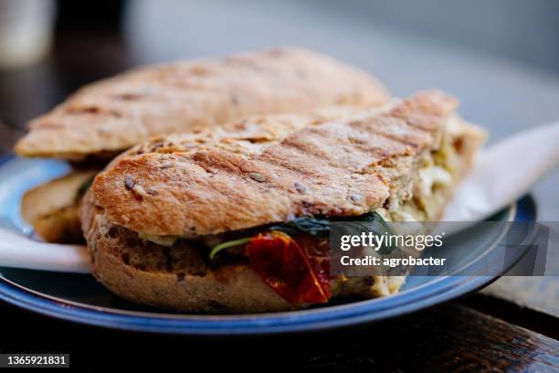 toast with tomato and mozzarella - panini stock pictures, royalty-free photos & images