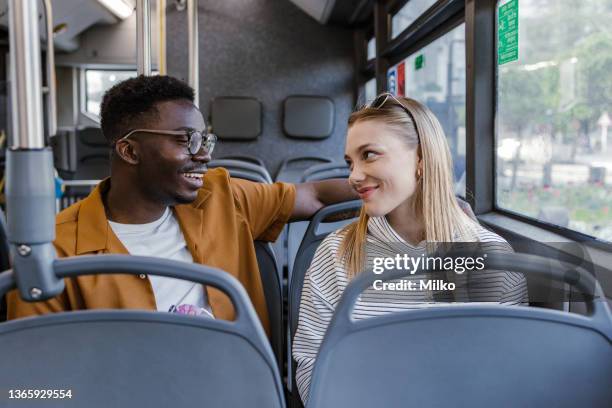 Bus Riders Sitting Happy Bus Rider Photos and Premium High Res Pictures - Getty Images