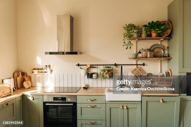 beautiful kitchen interior with new stylish furniture - beautiful metal stock-fotos und bilder