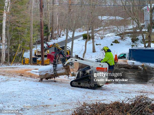 man riding on a bobcat tractor, copake - bobcat tractor stock pictures, royalty-free photos & images