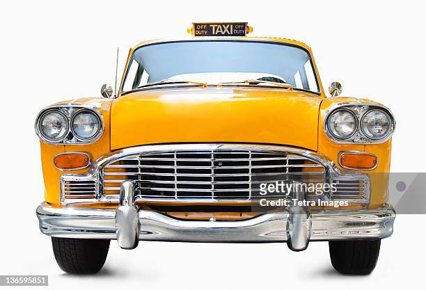 classic yellow cab on white background - nyc cab stock-fotos und bilder