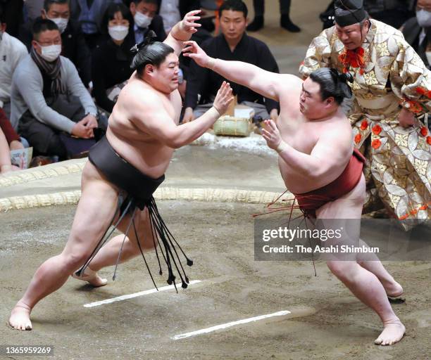 Abi and sekiwake Takanosho compete on day twelve of the Grand Sumo New Year Tournament at Ryogoku Kokugikan on January 20, 2022 in Tokyo, Japan.