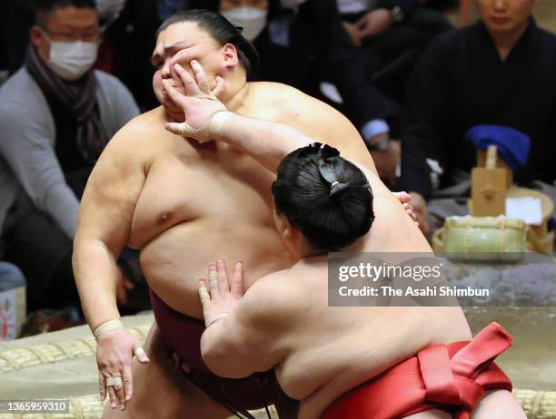 Onosho and Sekiwake Mitakeumi compete on day twelve of the Grand Sumo New Year Tournament at Ryogoku Kokugikan on January 20, 2022 in Tokyo, Japan.