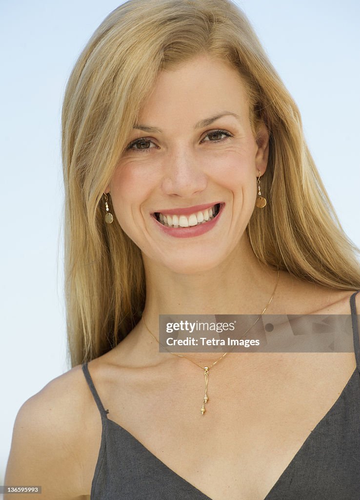 USA, New Jersey, Jersey City, Portrait of mid adult woman smiling