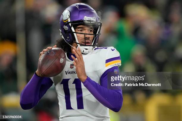 Kellen Mond of the Minnesota Vikings looks to pass the ball against the Green Bay Packers in the second half at Lambeau Field on January 02, 2022 in...