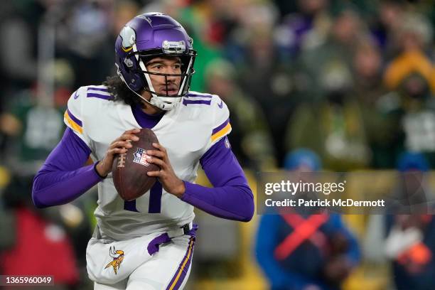 Kellen Mond of the Minnesota Vikings looks to pass the ball against the Green Bay Packers in the second half at Lambeau Field on January 02, 2022 in...