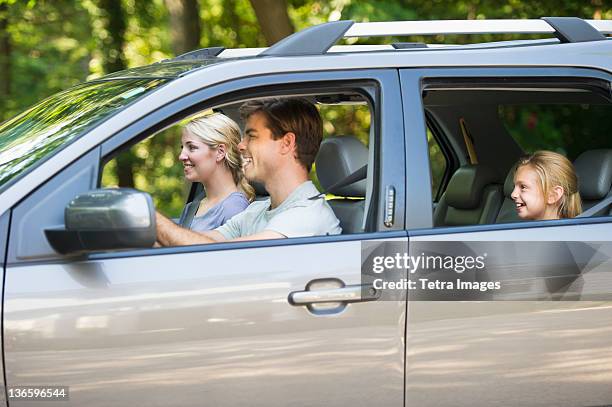 usa, new york state, old westbury, parents with daughter (10-11) driving car - car side stock pictures, royalty-free photos & images