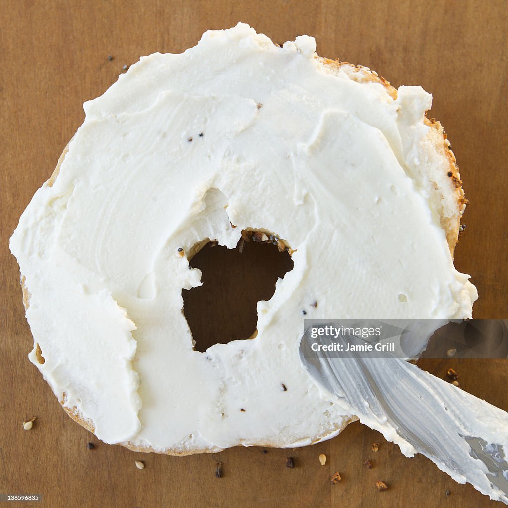 Close up of bagel with cream cheese