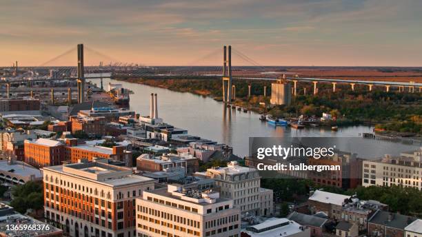 drone shot of downtown savannah and talmadge bridge - georgia us state stock pictures, royalty-free photos & images