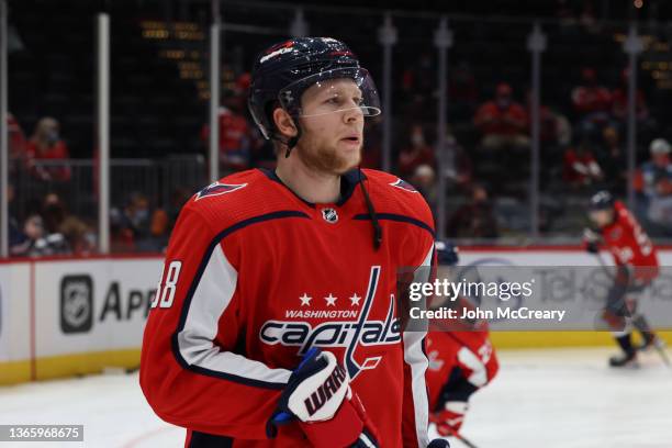 Dennis Cholowski of the Washington Capitals skates in warmups during a game against the Winnipeg Jets at Capital One Arena on January 18, 2022 in...