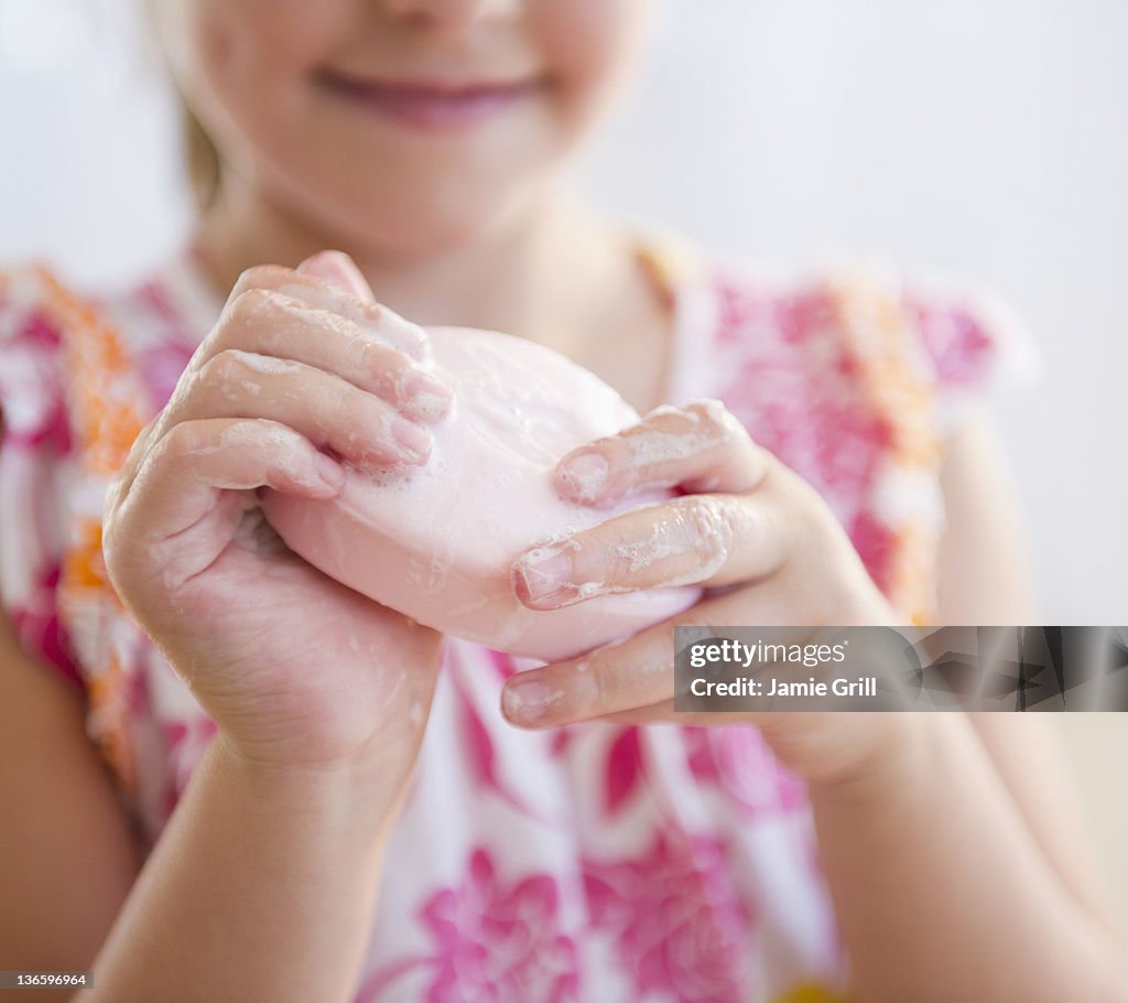 USA, New Jersey, Jersey City, Close up girl (6-7) washing hands