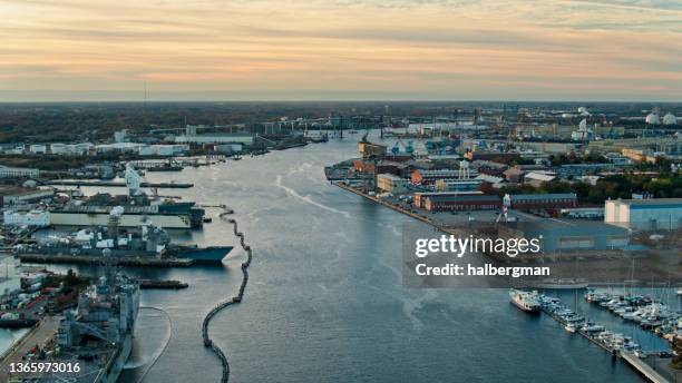 norfolk naval shipyard at sunrise - aerial - shipyard aerial stock pictures, royalty-free photos & images