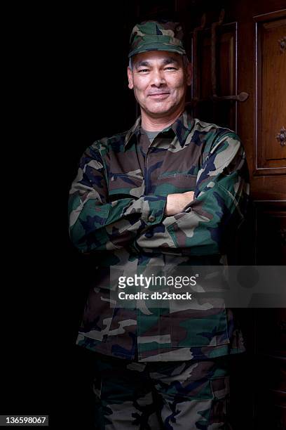 usa, arizona, scottsdale, portrait of mature man wearing military uniform - army soldier male stock pictures, royalty-free photos & images